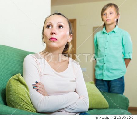Mother and son after quarrel 21595350