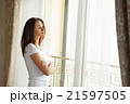 Portrait of a beautiful woman staying near the 21597505