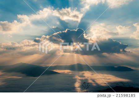 Autumn morning mountain view with sunbeam and haze 21598185