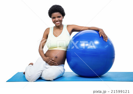 Pregnant woman with exercise ball Pregnant woman with exercise ball 21599121