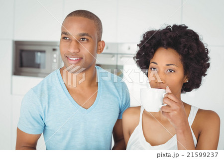 Peaceful couple standing in the kitchen 21599237