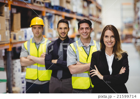 Portrait of warehouse manager and workers 21599714