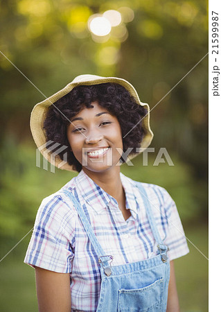 Smiling woman in the garden Smiling woman in the garden 21599987