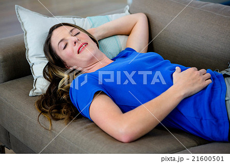smiling woman taking a nap 21600501