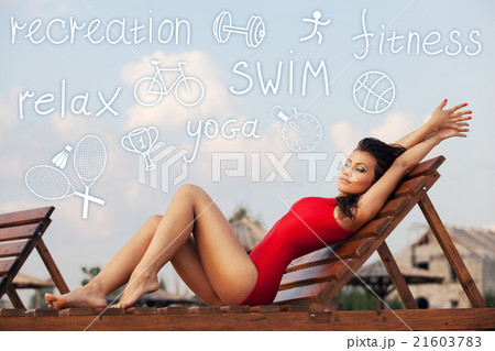 Young woman in red swimsuit 21603783