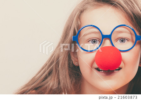 Little girl with red nose 21603873