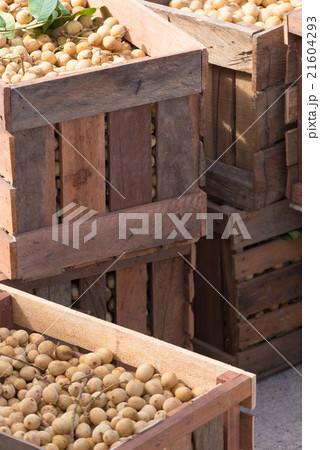 Tropical fruit stocked in crates 21604293