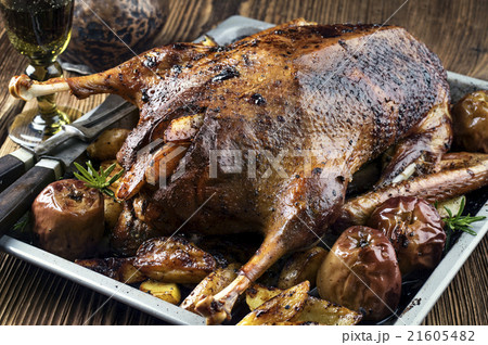 Roast Goose with Potatoes, Apple and Quince 21605482