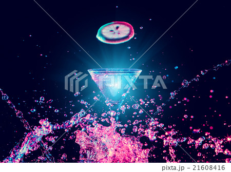 Colourful cocktail in glass with splash Colourful cocktail in glass with splash 21608416