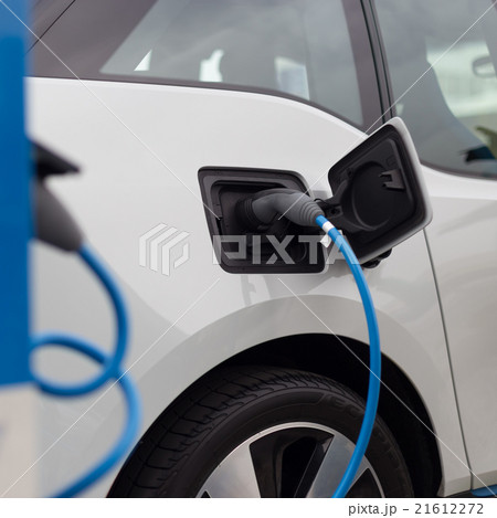 Electric Car in Charging Station. 21612272