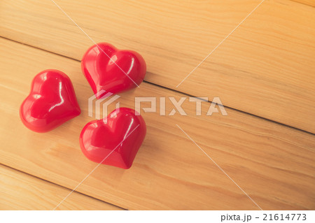 red heart on rustic wood with copy space 21614773