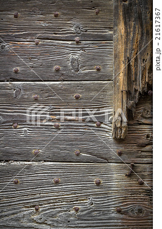 Rusty nails on planks 21617367