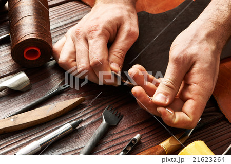 Man working with leather 21623264