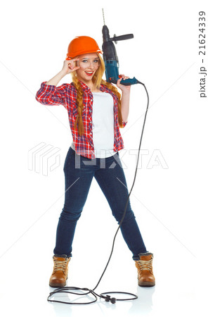 Female construction worker in a hard hat with a perforator 21624339