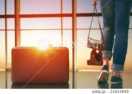 woman looks at a plane woman looks at a plane 21624849