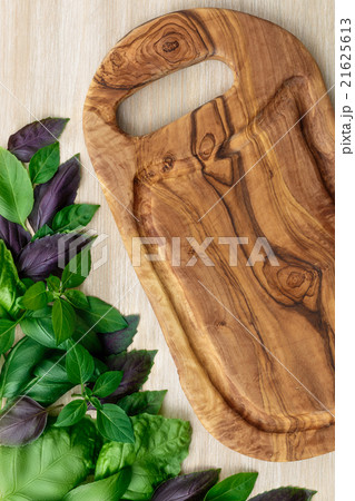 Heirloom basil on wooden table 21625613
