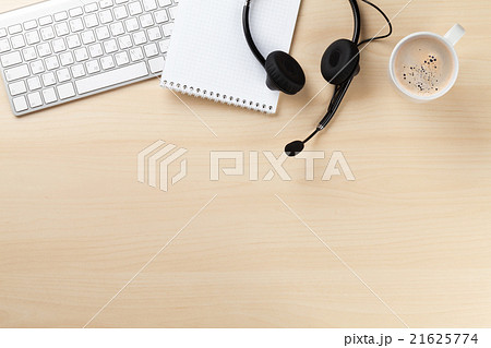 Office desk with headset and pc Office desk with headset and pc 21625774
