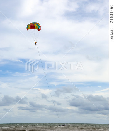 Parasailing sport on the cloud sky Parasailing sport on the cloud sky 21631460