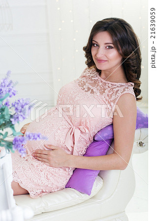 Pregnant pretty woman in wearing lace dress Pregnant pretty woman in wearing lace dress 21639059