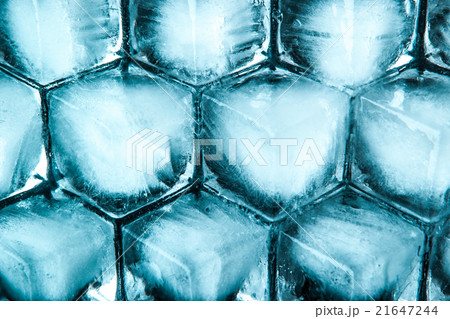 Honeycomb ice cubes background top view 21647244