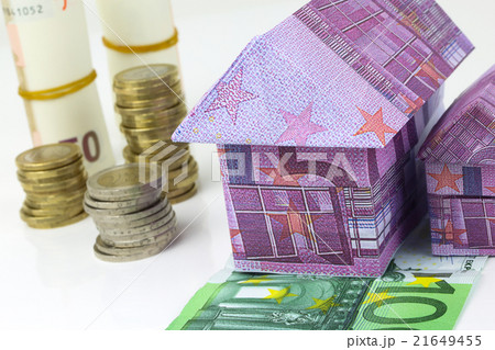 Euro bank notes House and coins 21649455