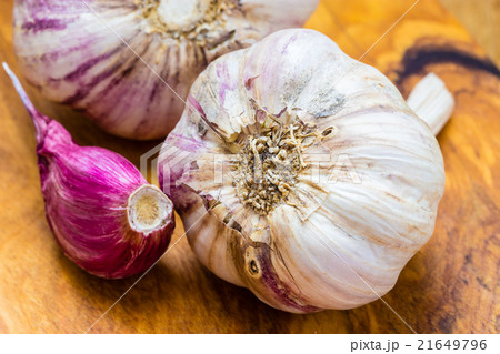 Organic garlic on wooden table background 21649796