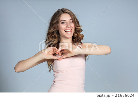 The young woman's portrait with happy emotions 21656024