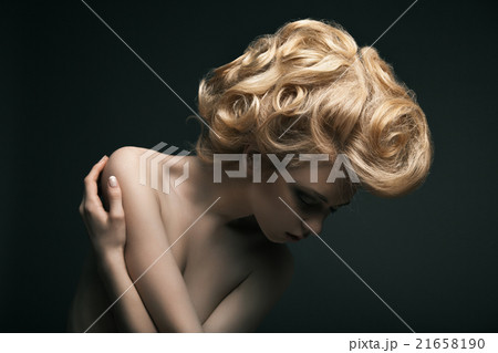 high fashion woman with abstract hair style 21658190