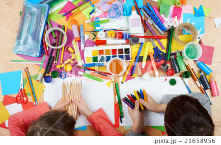 Child drawing top view. Artwork workplace  21658956