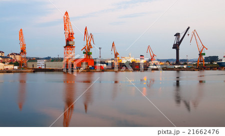 Morning view of cranes in seaport. Morning view of cranes in seaport. 21662476