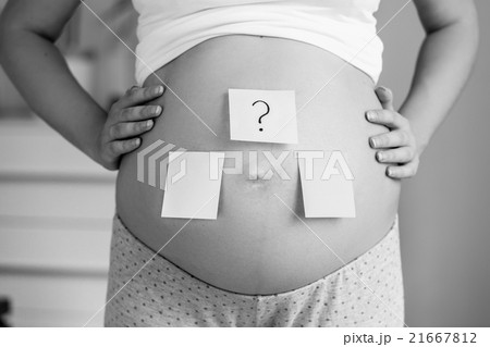 conceptual photo of pregnant woman making choice conceptual photo of pregnant woman making choice 21667812
