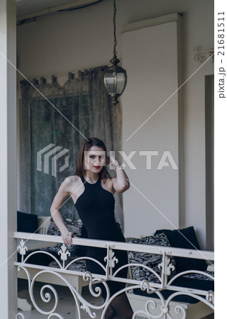 Beautiful girl on the balcony Beautiful girl on the balcony 21681511