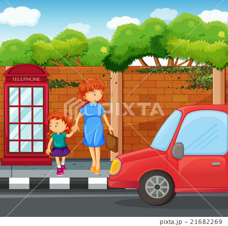Girl and mother standing on the sidewalk Girl and mother standing on the sidewalk 21682269