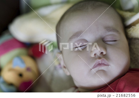 Calm sleeping baby at midday Calm sleeping baby at midday 21682556