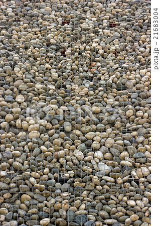 Backgrounds collection - Wall built of sea pebbles 21683004