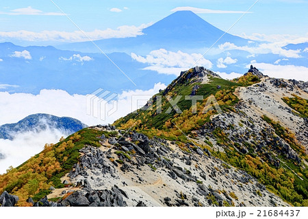 南アルプス観音岳から富士山と薬師岳の写真素材