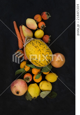 Mixed yellow orange fruit and veggies assortment Mixed yellow orange fruit and veggies assortment 21685304