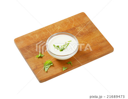 Bowl of white salad dressing 21689473