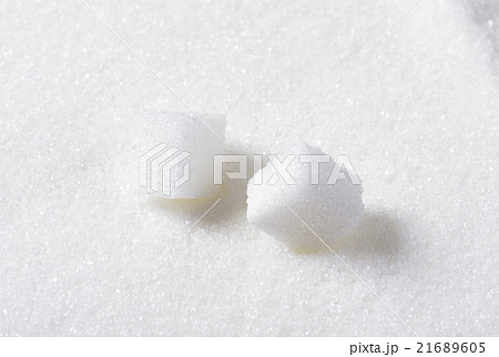 Two white sugar cubes 21689605