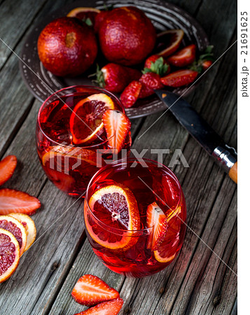 Blood orange strawberry rum punch 21691625