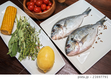 Fresh uncooked dorado Fresh uncooked dorado 21697791
