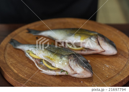 Fresh uncooked dorado Fresh uncooked dorado 21697794