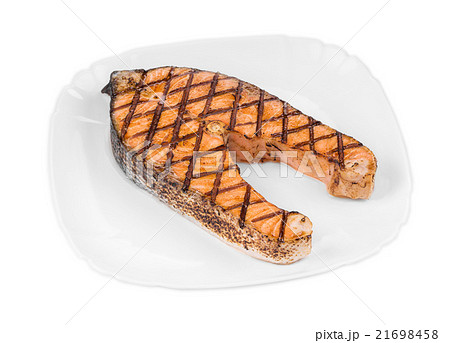 Fried salmon fillet on plate. 21698458