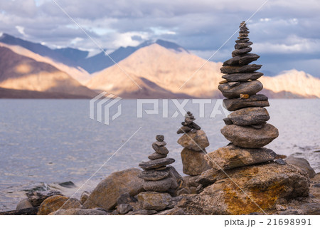 towers pile of stones beside Pangong Tso Lake 21698991