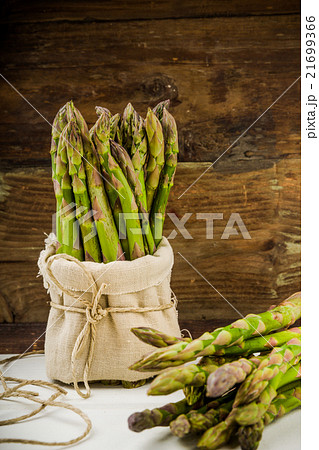 Fresh Green asparagus in a bunch and lots Fresh Green asparagus in a bunch and lots 21699366