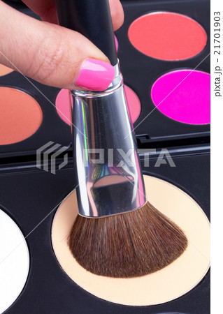 Make-up brush in hand Make-up brush in hand 21701903