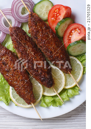 Grilled kebabs with vegetables close-up. top view 21705329