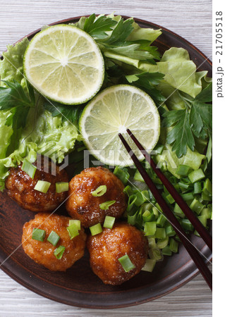 Fish balls with herbs and chopsticks top view Fish balls with herbs and chopsticks top view 21705518