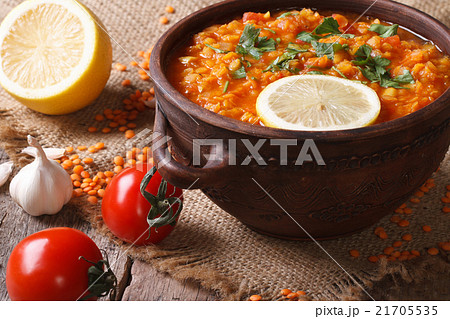 Red lentil soup with vegetables close-up Red lentil soup with vegetables close-up 21705535
