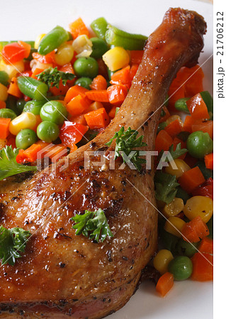 delicious roasted duck leg macro top view delicious roasted duck leg macro top view 21706212
